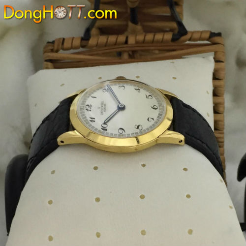 Đồng hồ cổ Universal xuất sứ Thụy Sĩ với mặt zin , 2kim rất đẹp, vỏ-đáy vàng đúc , núm bọc vàng cực đẹp.